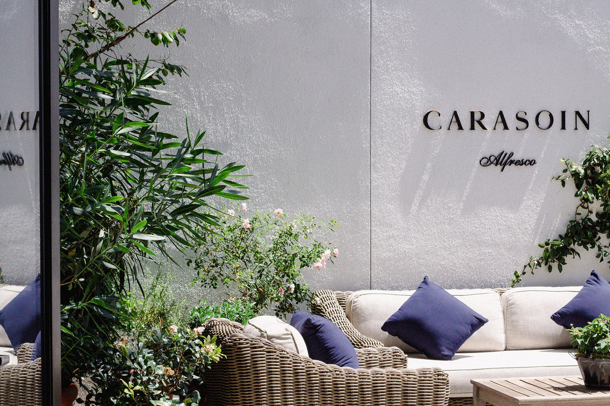 Outdoor seating area at Carasoin Spa. 